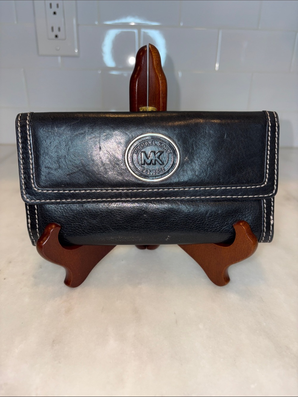 Michael Kors Black Leather Trifold Wallet with Logo Medallion